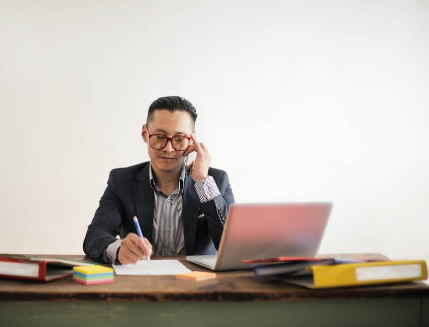 Business Development Manager on the phone with a client arranging a meeting