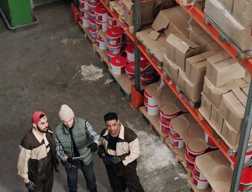 Buyer checking the stock level of the items with the warehouse member