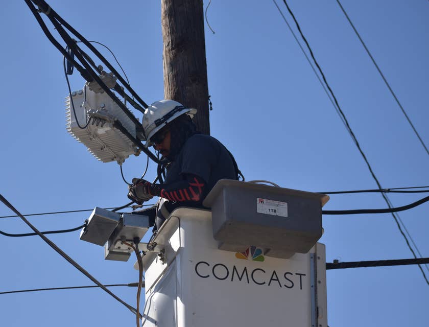 Cable Technician installing a line for a cable company