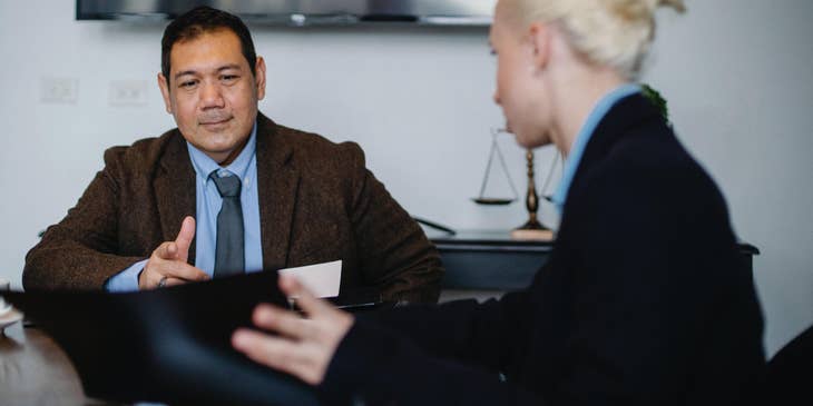 The case manager coordinates with a client to create a treatment plan.