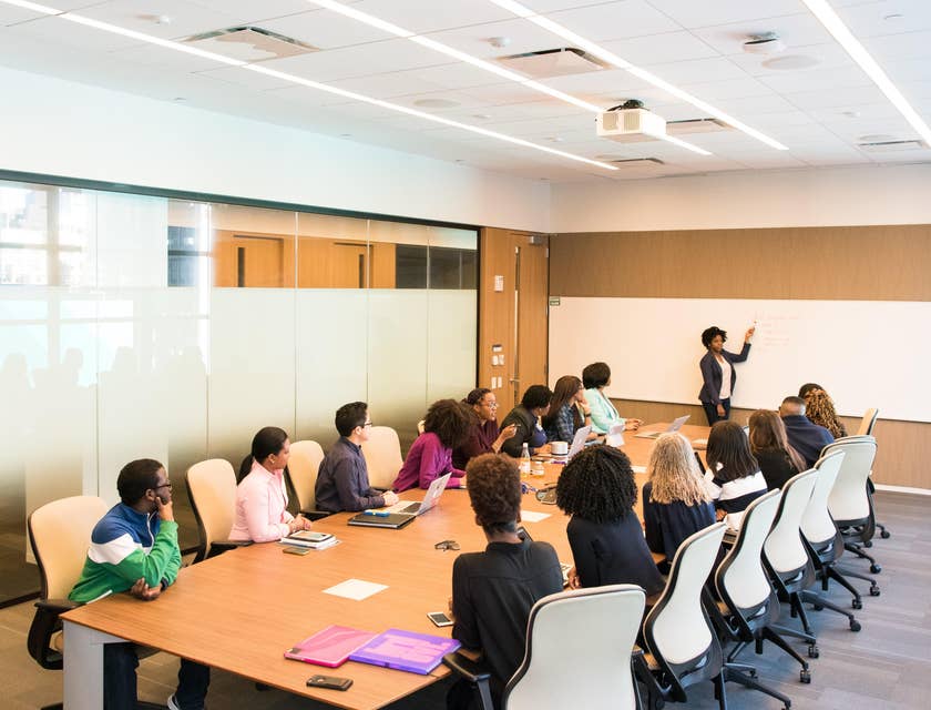 Center Director is having a meeting with teachers in a conference room