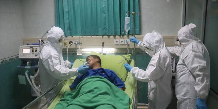 Charge Nurse mentoring new staff in the emergency room.