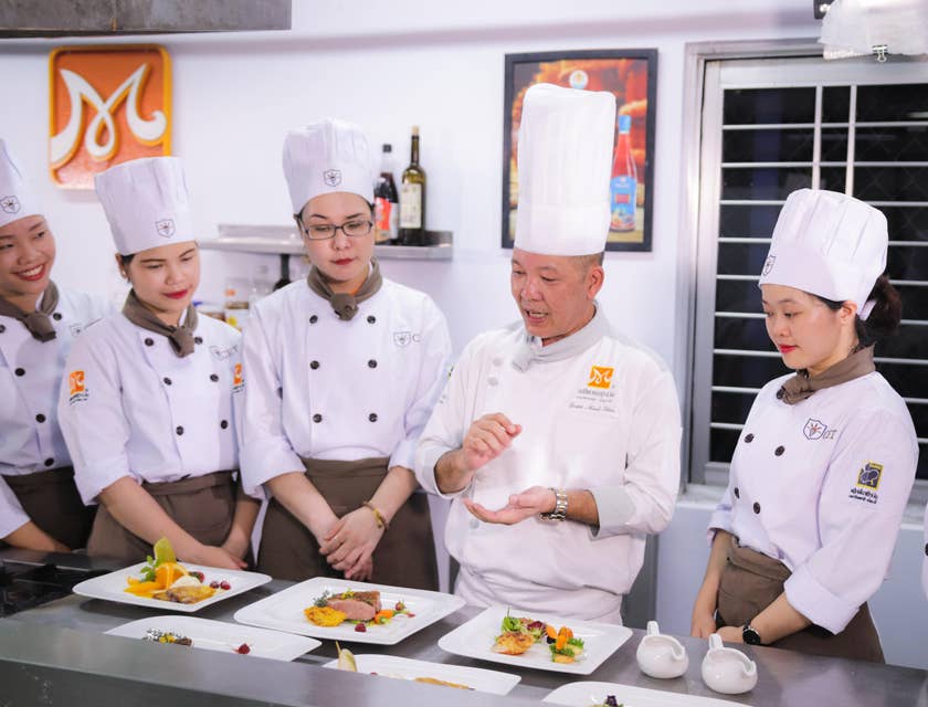The chef provides training on food preparation.