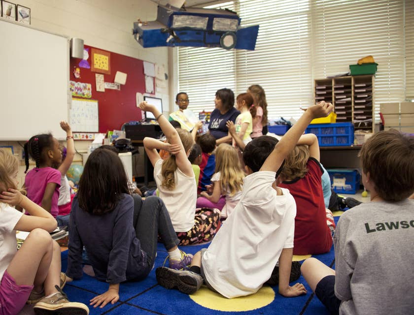 Child Care Specialist supervising a group of children in a daycare center