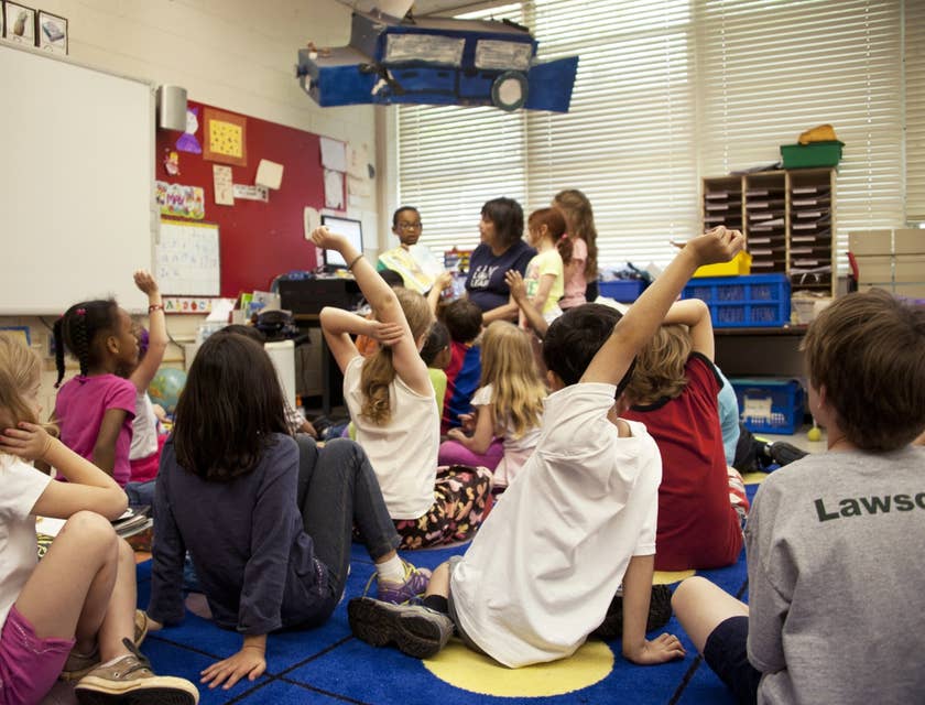 Child Care Specialist supervising a group of children in a daycare center