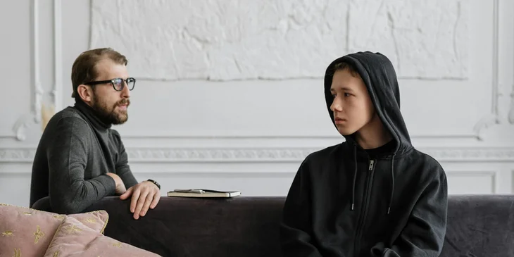 A child psychiatrist in an individual therapy session.