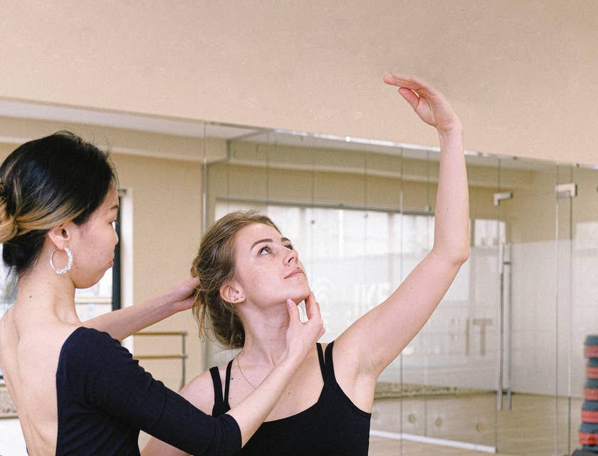 Choreographer teaching a dance to a dancer