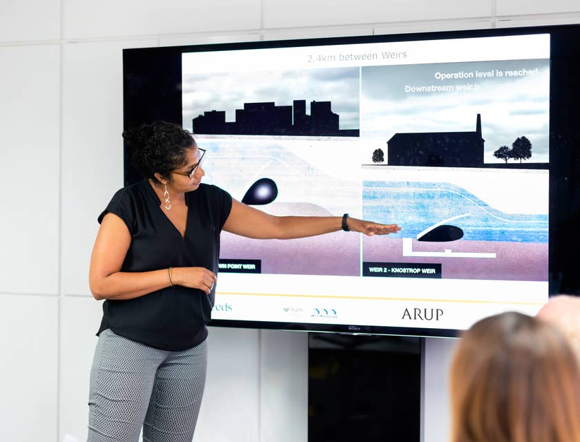 female Civil Engineer doing a presentation about a dam project