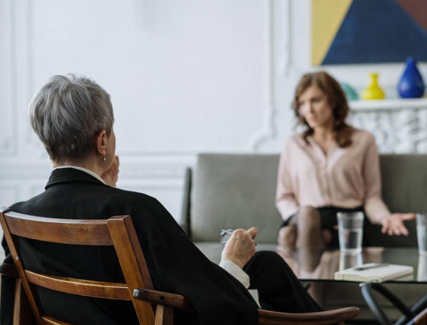 Clinical Psychologist having a therapy session with a client.