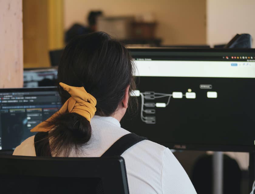 Cloud Architect designing a system on her workstation for a new project