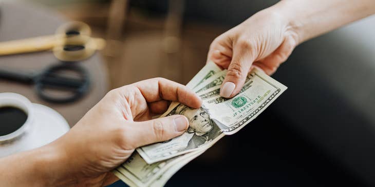 a Collection Agent receiving twenty dollar bills from a client