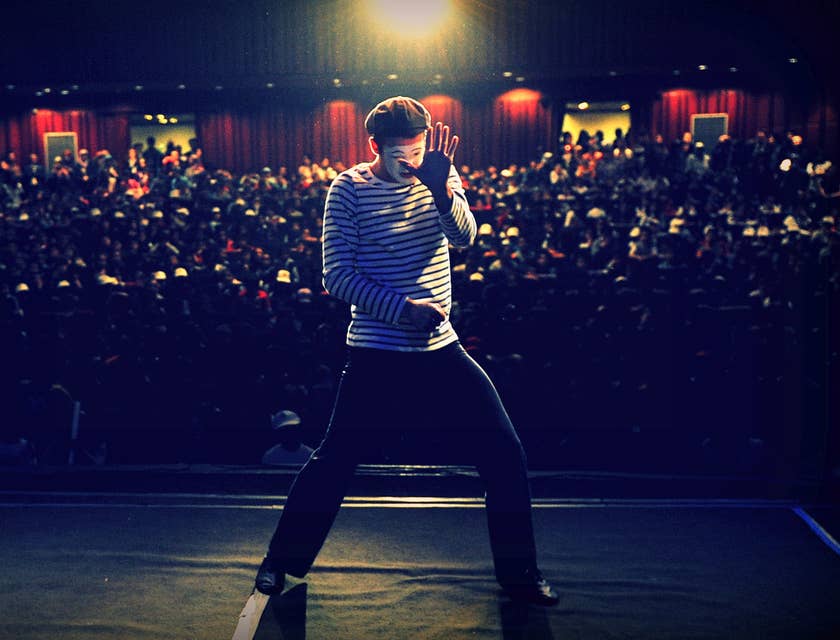 Comedian who specializes in miming performing in front of a crowd