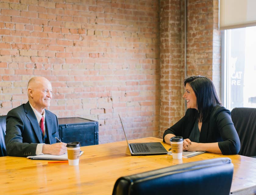 Commercial Loan Officer having discussions with her client inside the meeting room