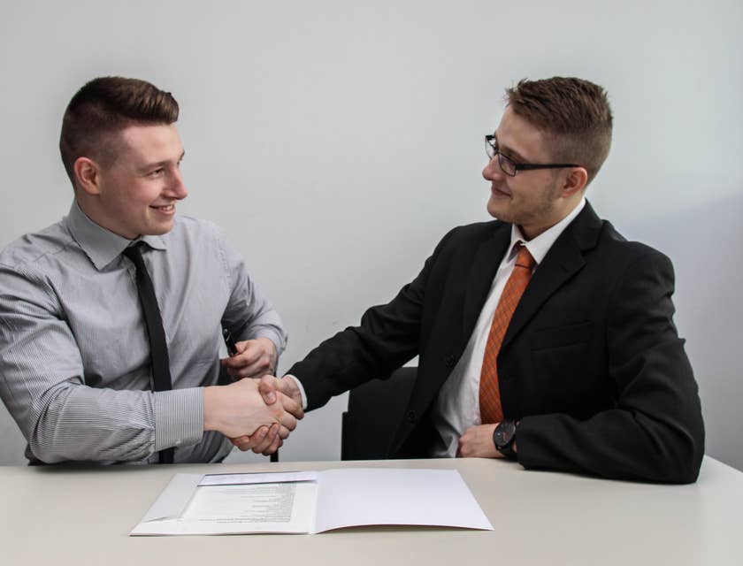 Commercial Real Estate Broker shaking hands with the client after successfully finding a suitable property