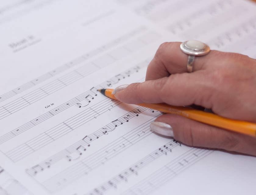 Composer holding a pen