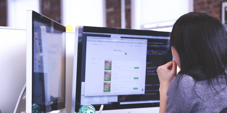 Computer Engineer working on a new software system and looking at her screen