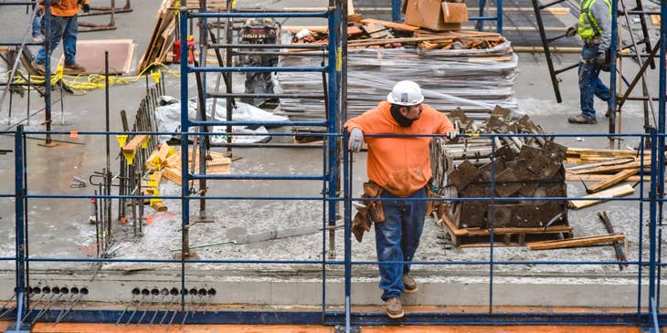 A Construction Superintendent overseeing the progress of the construction site.