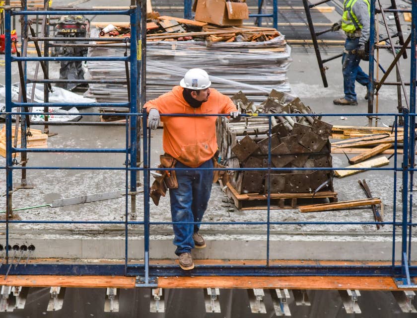 A Construction Superintendent overseeing the progress of the construction site.
