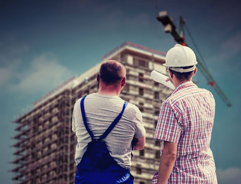 Construction Supervisor discussing with one of his crew members..