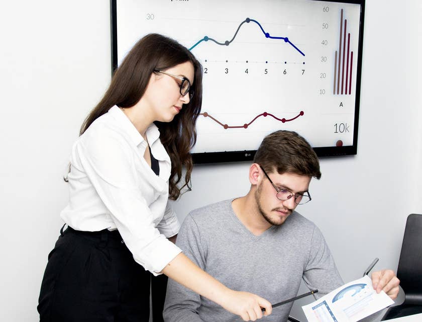 Controller presenting financial reports and risk analysis.