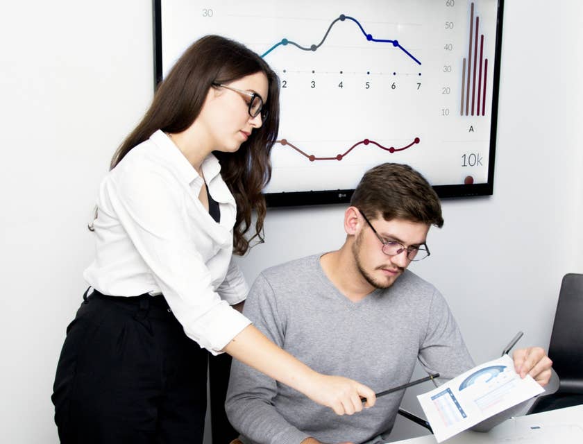 Controller presenting financial reports and risk analysis.