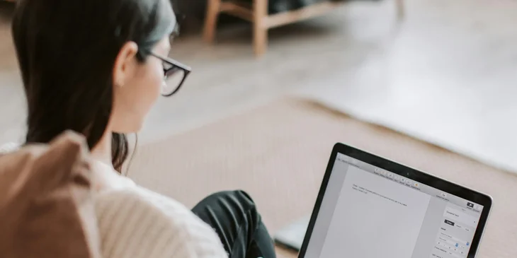 A copywriter creating a content on a laptop.