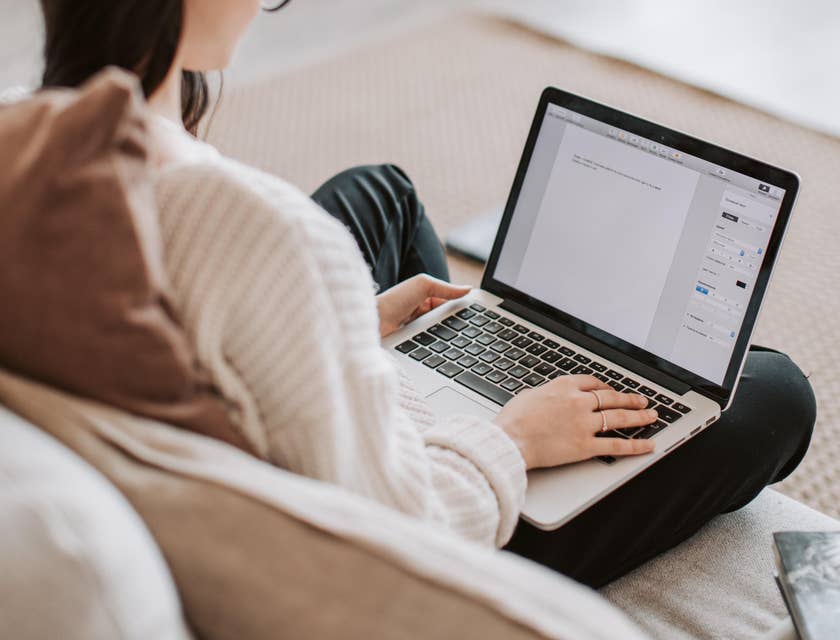 A copywriter creating content on a laptop.