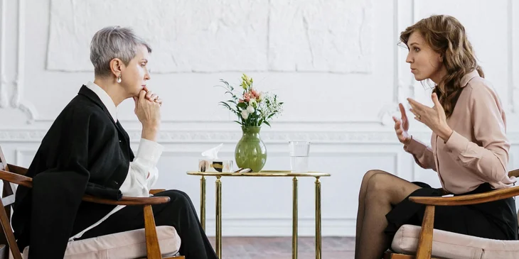 A counseling psychologist conducting one-on-one counseling.