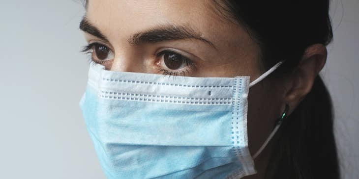 Woman wearing a face mask because of COVID-19