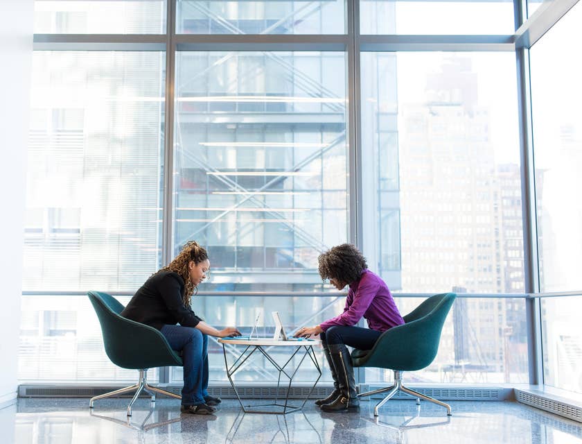 Creative Consultant on a meeting with a client showing her some of the good campaigns for her business