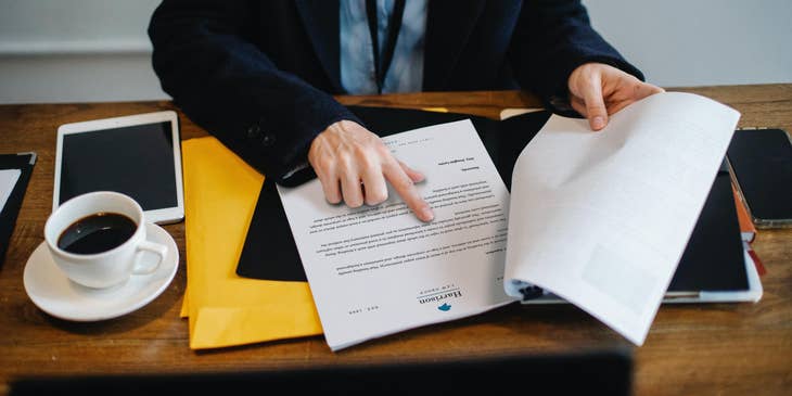 Criminal Analyst reviewing the criminal report before passing it