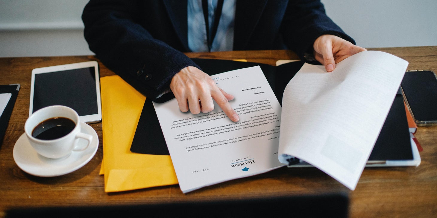 Criminal Analyst reviewing the criminal report before passing it