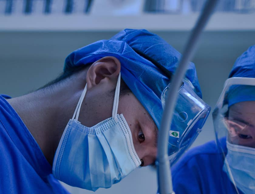Man conducting dental surgery