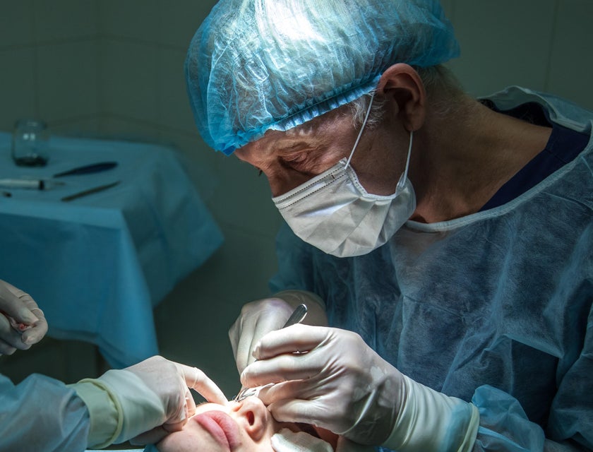 Dermatologist performing a noninvasive surgical procedure on the skin.