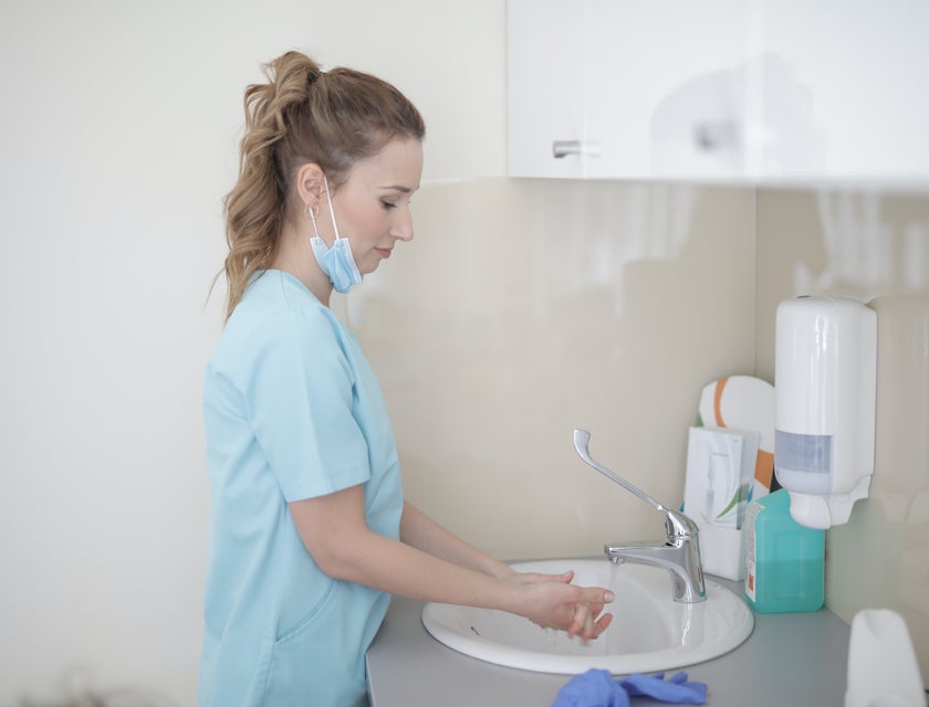 Dialysis Technician doing handwashing after attending to patient needs.