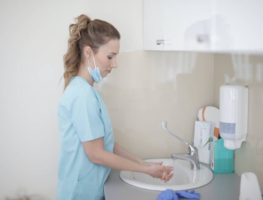 Dialysis Technician doing handwashing after attending to patient needs.