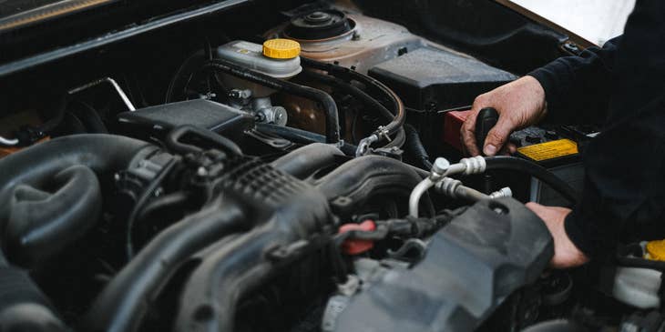 Diesel Mechanic working on a vehicle
