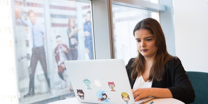 Digital Project Manager looking at the timeline of the project her team is working on