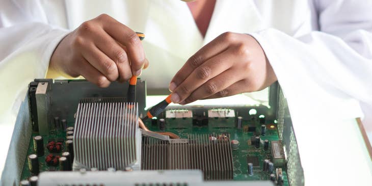 female electrical engineer focused on testing the product for final approval