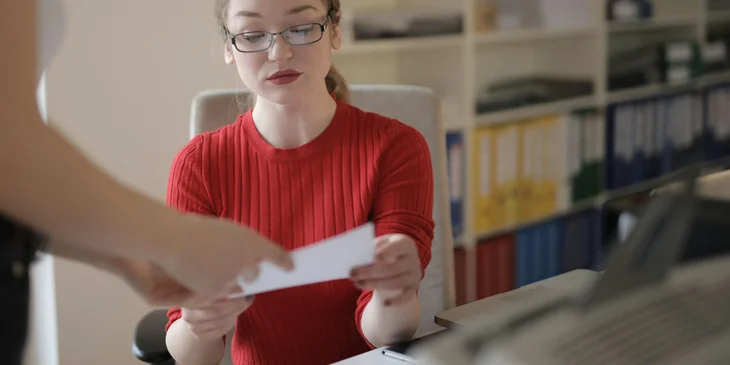 An entry level accountant assisting in income statements.
