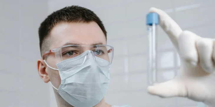 An epidemiologist performing laboratory tests to analyze data.