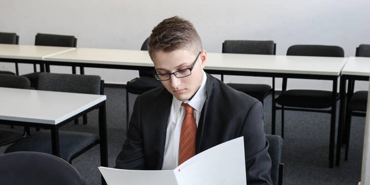 Escrow Officer preparing clients legal documents for sale closure
