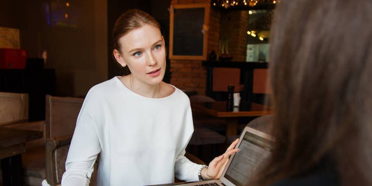 The Event Specialist interacts with a potential client.