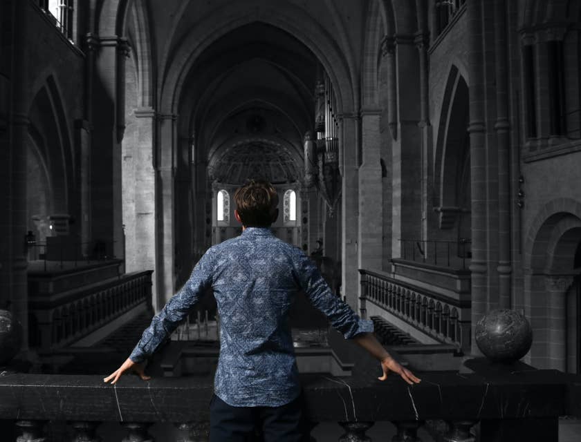 Executive Pastor standing inside the church checking its interior