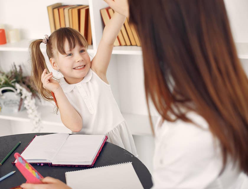 female Family Advocate interacting with a child for evaluation purposes