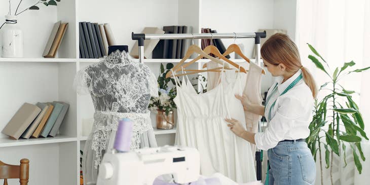 Fashion Director selecting outfits themed for the new promotion.