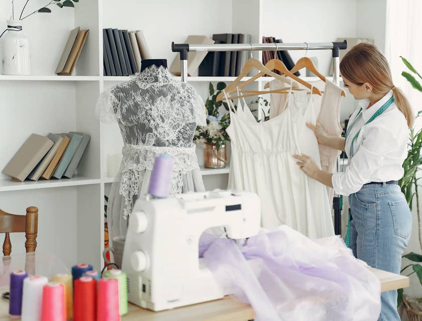 Fashion Director selecting outfits themed for the new promotion.