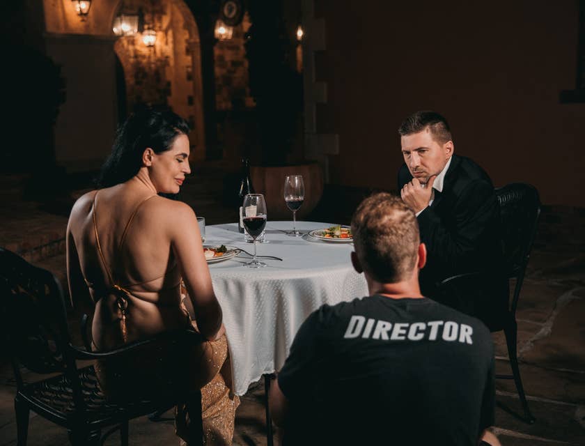 Film Director telling the actors the emotions he wanted to come out of the scene