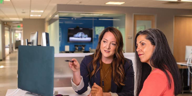 Financial counselor assisting patients with financial applications.