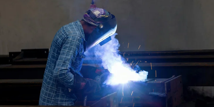 A fitter job working on a factory.